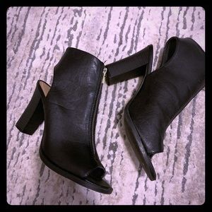 Like new, Zip up heels. Open toe. Size 8.5